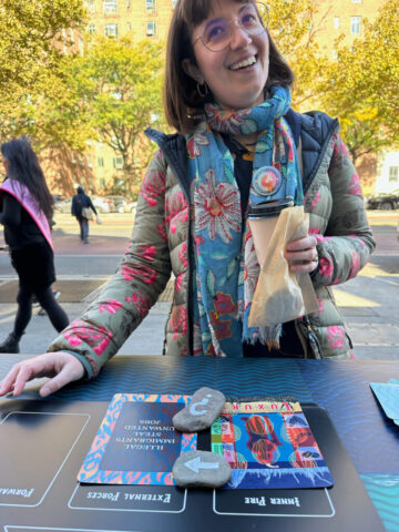 A woman discusses the game and smiles
