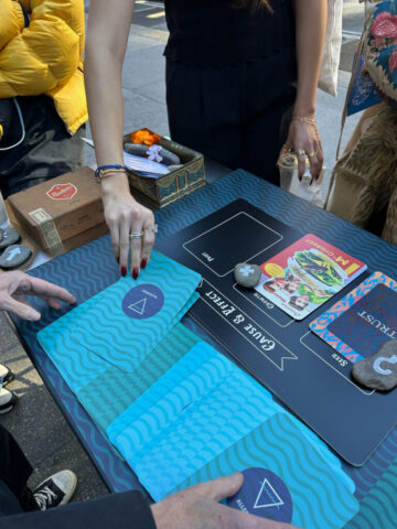 game play at a table outside in summer