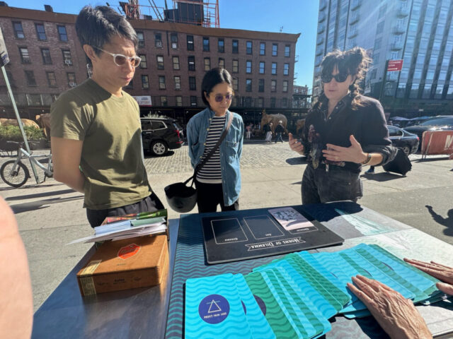 People talk and gesture while playing The Iceberg